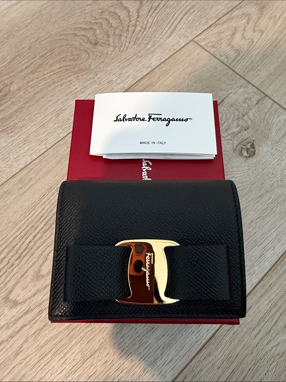 Salvatore Ferragamo Black Leather Wallet with Gold Vara Bow